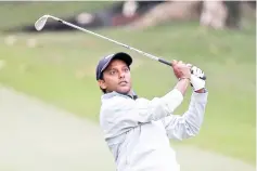  ?? — AFP photo ?? India's SSP Chawrasia hits a shot on the 18th hole during round three of the Hong Kong Open golf tournament at the Hong Kong Golf Club on November 25, 2017.