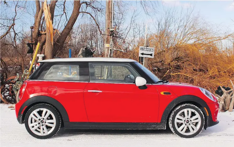  ?? — PETER BLEAKNEY/DRIVING.CA ?? The 2019 Mini Cooper 3-Door is a cheeky nod to the original version of this fuel-efficient compact. The cabin has round features and toggle switches.