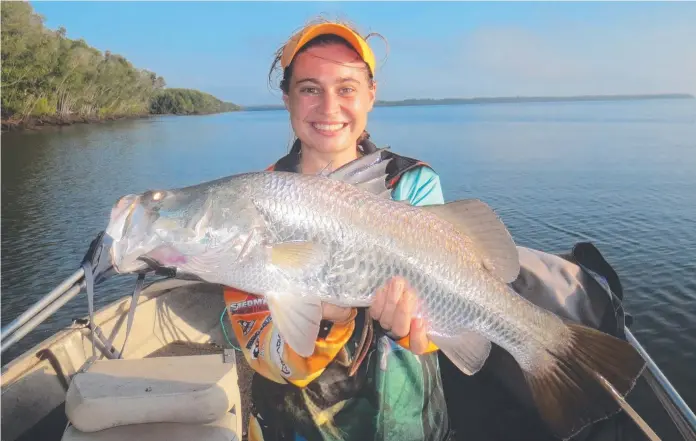  ??  ?? Ash Baldwin went out trolling lines off Maningrida, hunting for a red tagged barra, but ended up landing a personal best of nine barra instead