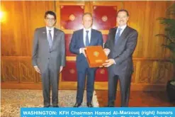  ??  ?? WASHINGTON: KFH Chairman Hamad Al-Marzouq (right) honors Kuwait’s Ambassador to the United States Sheikh Salem Abdullah Al-Jaber Al-Sabah (center).