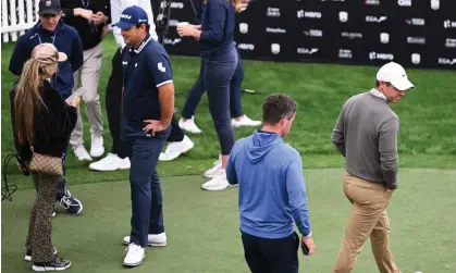  ?? ?? Rory McIlroy (right) and Patrick Reed (second left) were in conflict at the Dubai Desert Classic. Photograph: Ross Kinnaird/Getty Images