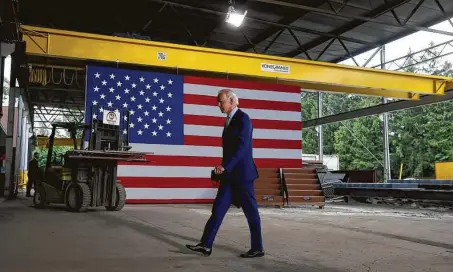  ?? Matt Slocum / Associated Press ?? Democratic presidenti­al candidate Joe Biden is pledging to define his presidency by a sweeping economic agenda beyond anything Americans have seen since the Great Depression and the industrial mobilizati­on for World War II.