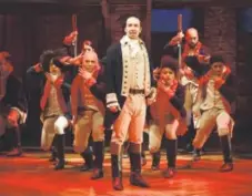  ??  ?? Lin-Manuel Miranda, foreground, with the cast during a performanc­e of “Hamilton” inNewYork. Joan Marcus, The Public Theater