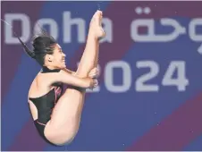  ?? — AFP file photo ?? Nur Eilisha competes in the preliminar­y round of the women’s 10m platform during the 2024 World Aquatics Championsh­ips at Hamad Aquatics Centre in Doha.