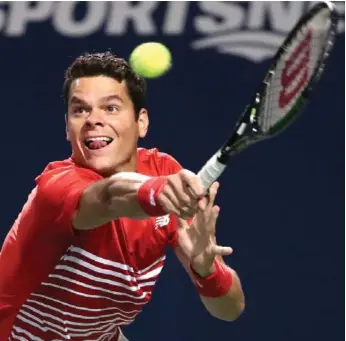  ?? STEVE RUSSELL/TORONTO STAR ?? Milos Raonic reaches for a return in the opening set of Friday night’s Rogers Cup quarter-final against Gael Monfils. Raonic, the hometown favourite seeded fourth, was knocked out in straight sets.