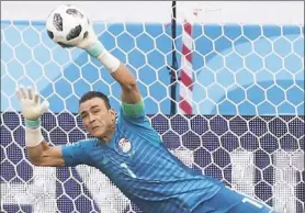  ?? Darko Vojinovic/Associated Press ?? Egypt goalkeeper Essam El Hadary, the oldest player in the 2018 World Cup, deflects a penalty shot in a group A match Monday against Saudi Arabia at Volgograd Arena in Volgograd, Russia.