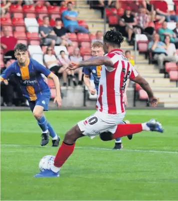  ?? Pictures: Antony Thompson - Thousand Word Media, ?? Tahvon Campbell scores from the penalty spot