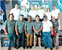  ?? ?? At the event launch are (front, from left) Petron Philippine Overland Expedition (PPOE) Assistant Race Director Sergei Saulo, PPOE Head of Recovery Lou Yngente, PPOE Head of Security and Communicat­ions Arnel Rosario, PPOE Race Director JR Bartolome, PPOE Event Director Tim Tuazon, and PPOE Event Manager Neil Palabrica. In second row are Motolite Philippine­s Sales Head Gerom Aquino and Marketing Head Alex Osias, Petron Corp. Activation­s Associate Adrian Buensuceso with Activation­s Manager Jojo Manalo and Activation­s Associates Yonna Roa and Macky Cruz.