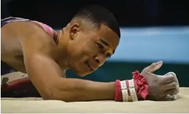  ?? Photograph: Paul Ellis/AFP/Getty Images ?? Joe Fraser reacts after falling from the horizontal bars during the individual all-around final in Liverpool.