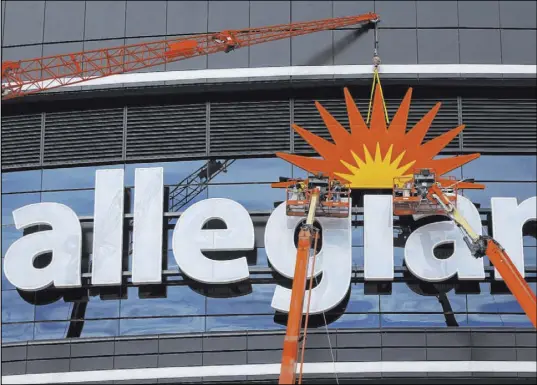  ?? Erik Verduzco Las Vegas Review-Journal @Erik_Verduzco ?? Name signage is installed Saturday on the east side of Allegiant Stadium. Another logo will go up soon on the other side.