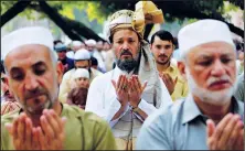  ?? (AP/Muhammad Sajjad) ?? Muslims pray the Eid al-Fitr prayer, marking the end of Ramadan, Islam’s holy month of fasting, Monday in Peshawar, Pakistan.