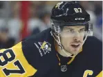  ?? (Charles LeClaire-USA TODAY Sports/Reuters) ?? A COMMEMORAT­IVE PATCH honoring the victims of the Tree of Life Synagogue massacre is seen on the jersey of Pittsburgh Penguins center Sidney Crosby (87).