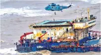  ??  ?? Indian Navy’s rescue mission continues near GAL Constructo­r barge, which ran aground off Mumbai, on Thursday