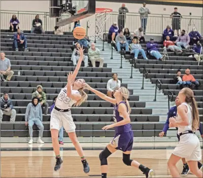  ?? Tim Godbee ?? Calhoun senior Anna George goes for the layup during the Lady Jackets’ game against Cartersvil­le at Calhoun High School on Friday, Dec. 20.