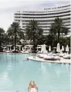  ?? JOSE A. IGLESIAS jiglesias@elnuevoher­ald.com ?? A hotel guest enjoys having the pool practicall­y to herself at the Fontainebl­eau Miami Beach.