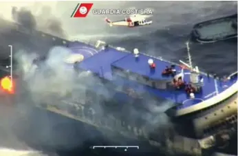  ?? THE ASSOCIATED PRESS/ITALIAN COAST GUARD ?? Smoke billows from the Italian-flagged Norman Atlantic that caught fire in the Adriatic Sea Sunday.