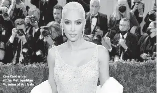  ?? EVAN AGOSTINI/INVISION/AP ?? Kim Kardashian at the Metropolit­an Museum of Art Gala