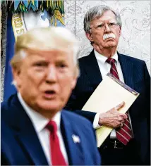  ?? WASHINGTON POST ?? National security officials testified that former national security adviser John Bolton was alarmed about efforts by President Donald Trump to push Ukraine to investigat­e the president’s rivals.