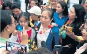  ?? AFP ?? Vietnam dissident blogger Nguyen Ngoc Nhu Quynh, centre, is surrounded by well-wishers as she arrives at Houston George Bush airport in Houston, Texas.