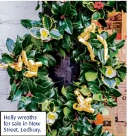  ??  ?? Holly wreaths for sale in New Street, Ledbury.