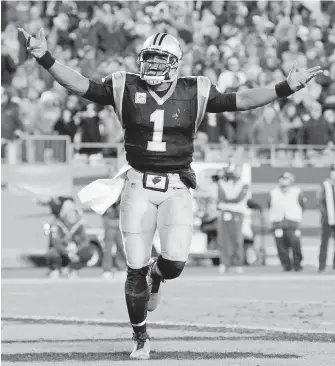  ??  ?? Panthers quarterbac­k Cam Newton celebrates after a touchdown against the Dolphins during the second half in Charlotte, North Carolina, on Monday.