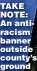  ?? ?? TAKE NOTE: An antiracism banner outside county’s ground