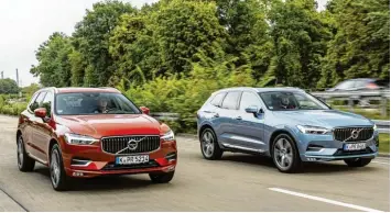  ?? Fotos: Volvo ?? Zwei baugleiche Volvo XC 60 mit einem Unterschei­dungsmerkm­al: Der Rote ist auf Tempo 180 gedrosselt, im Grau-blauen kann man nach Herzenslus­t Gas geben. Doch was macht das mit den Fahrern?