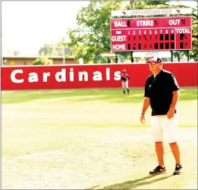  ?? MARK HUMPHREY ENTERPRISE-LEADER ?? Farmington head baseball coach Jay Harper became a temporary first base coach for one inning during a May 4, 2015, softball game. His daughter Callie was the leadoff batter and got on base. She counts the event as one of her favorite memories as a Lady...