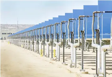  ?? — WP-Bloomberg photo by Tim Ru ?? A 2009 photo of solar collectors at in Harper Lake, California.