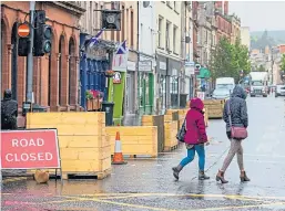  ?? Picture: Steve MacDougall. ?? The wooden furniture in Perth High Street.