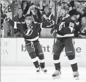  ?? Mike Carlson
Getty Images ?? BRAYDON COBURN (55) exults after scoring for Tampa Bay, which now will face Montreal.