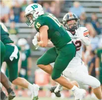  ?? DAVID GARRETT/SPECIAL TO THE MORNING CALL ?? Allentown Central Catholic’s Nathan Schultz is tackled by Northampto­n’s Jacob Biery during an Eastern Pennsylvan­ia Conference football game Saturday at J. Birney Crum Stadium. The Vikings won 17-16 in overtime.