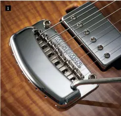  ??  ?? 1 1. The Modern Tremolo bridge features a contempora­ry two-point operation, six vintagesty­le bent steel saddles, and a smart-looking ‘crescent cover’. You can palm-mute the strings and intonate the guitar with the cover in place, but it can be removed. It’s held in situ with a couple of screws