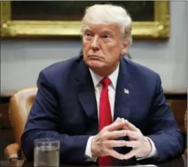  ?? ALEX BRANDON - THE ASSOCIATED PRESS ?? President Donald Trump waits to speak during a discussion for drugfree communitie­s support programs, in the Roosevelt Room of the White House, Wednesday in Washington.