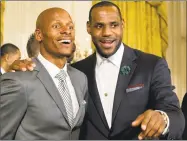  ?? Jacquelyn Martin / Associated Press ?? In this Jan. 14, 2014 file photo then-Miami Heat players Ray Allen, left, and LeBron James look out into the crowd after a ceremony in the East Room of the White House in Washington where President Obama honored the 2013 NBA champions.