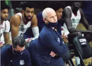  ?? David Butler II / Associated Press ?? UConn coach Dan Hurley watches from the sideline in the second half against St. John’s in Storrs on Monday.