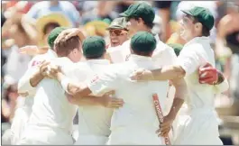  ??  ?? AUSTRALIA’S players celebrate after winning their third Test against India
at the Waca in Perth yesterday. — Reuters