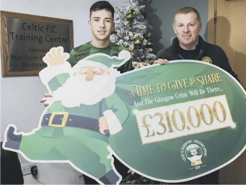  ??  ?? 0 Celtic’s Mikey Johnston, left, and Neil Lennon thanked contributo­rs to the club’s 2019 Christmas Appeal which raised £310,000, all of which has now been distribute­d to a variety of causes including families with children in need, OAPS, the homeless and Women’s Aid.
