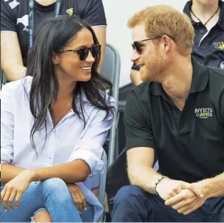  ??  ?? Left Prince Harry and Meghan Markle at the Invictus Games in 2017