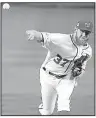  ?? AP/BRANDON POOL ?? Washington Nationals starting pitcher Stephen Strasburg allowed 2 runs on 3 hits while striking out 10 and walking 1 in 7 innings in Game 1 of the National League division series against the Chicago Cubs on Friday night in Washington, D.C.