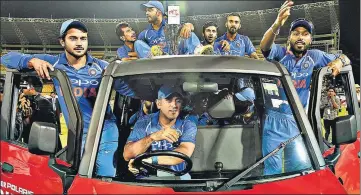  ?? AFP ?? The Indian team went on a ride, with MS Dhoni as the driver, after sweeping Sri Lanka 50 in the ODI series at Premadasa Stadium in Colombo on Sunday. India beat Sri Lanka by six wickets in the final ODI.