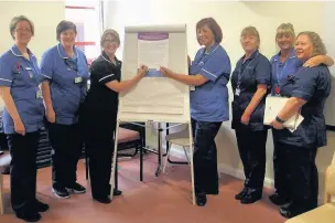  ?? Ormskirk maternity staff sign the Caring for You Charter Dickie Felton ??