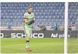  ?? FOTO: DPA ?? Lukas Hradecky ist nach seinem groben Patzer geknickt.