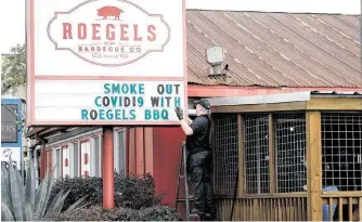  ?? Karen Warren / Staff photograph­er ?? Roegels Barbecue Co. is taking a proactive approach to dealing with the coronaviru­s.
