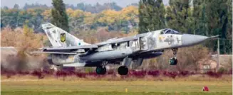  ??  ?? Locally based Su-24 lands after a mission