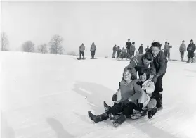  ??  ?? The winter of ’63 – but snow was not always welcome at Christmas. (Not sure where this Post archive picture was taken, but we think it was Stoke Park. If you’re in the picture and know any different, do tell us!)