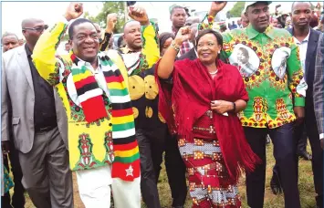  ?? Picture: Chief Photograph­er Believe Nyakudjara ?? President Emmerson Mnangagwa, First Lady Amai Auxillia Mnangagwa and Midlands Provincial Affairs Minister Owen Ncube salute tens of thousands of ZANU-PF supporters on their arrival for a rally in Mvuma yesterday.