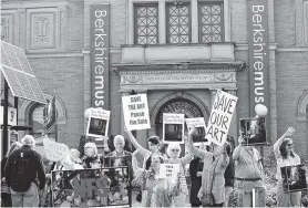  ?? ASSOCIATED PRESS FILE PHOTO ?? People opposed to the selling of the Berkshire Museum’s art to fund an expansion and endowment protest in front of museum in Pittsfield, Mass., earlier this month.