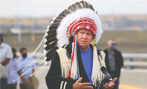  ?? PHOTOS: GAVIN YOUNG/ FILES ?? Tsuut'ina Chief Roy Whitney speaks at the opening of the Tsuut'ina Trail section of the southwest Calgary ring road on Oct. 1.