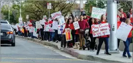  ?? ?? Chino Valley educators and allies march from Kimball Park on Thursday to the Board of Education meeting. The union, which is seeking 10.25% raises, says talks with the district stalled last month. A meeting with a state mediator is scheduled for April 16.